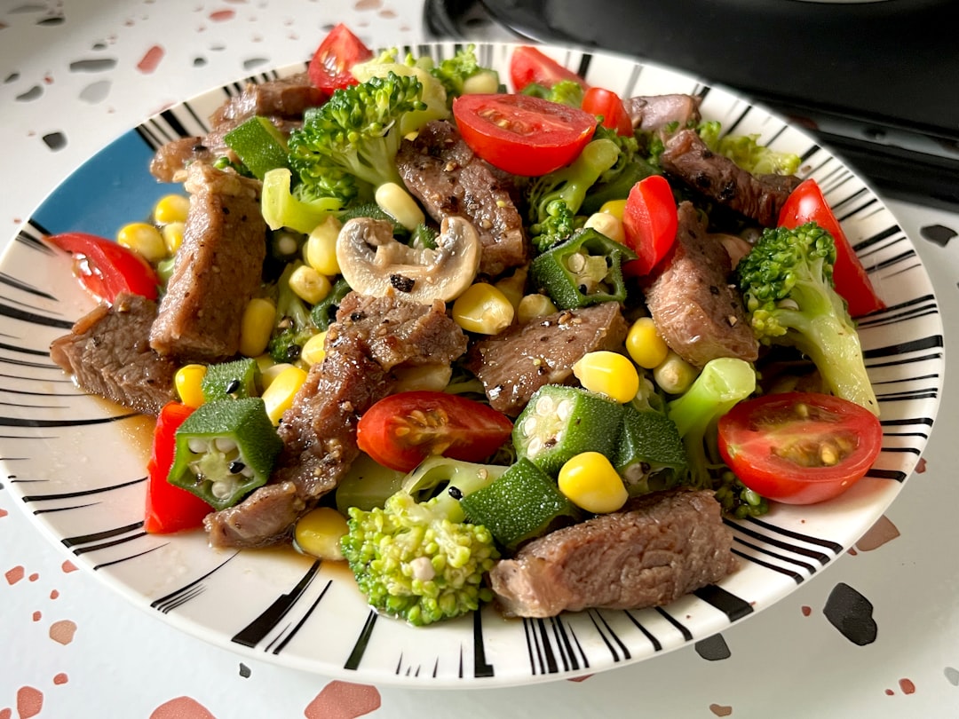 An AI-generated image of a colorful gourmet salad in a glass bowl.